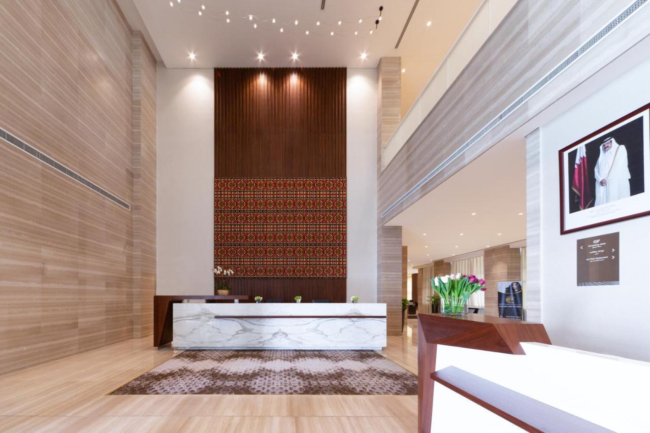 Dusitd2 Salwa Doha Hotel Exterior photo The lobby of the hotel