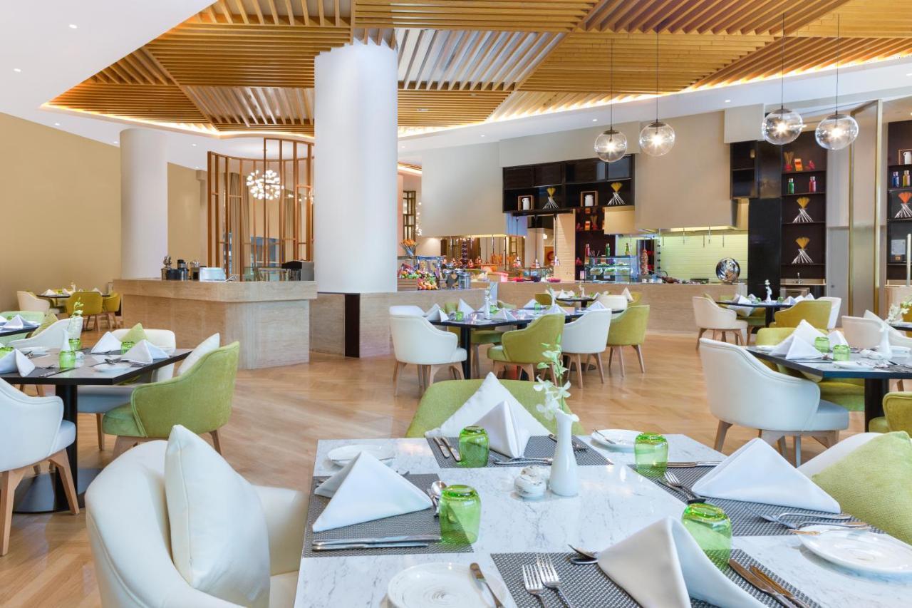 Dusitd2 Salwa Doha Hotel Exterior photo The restaurant