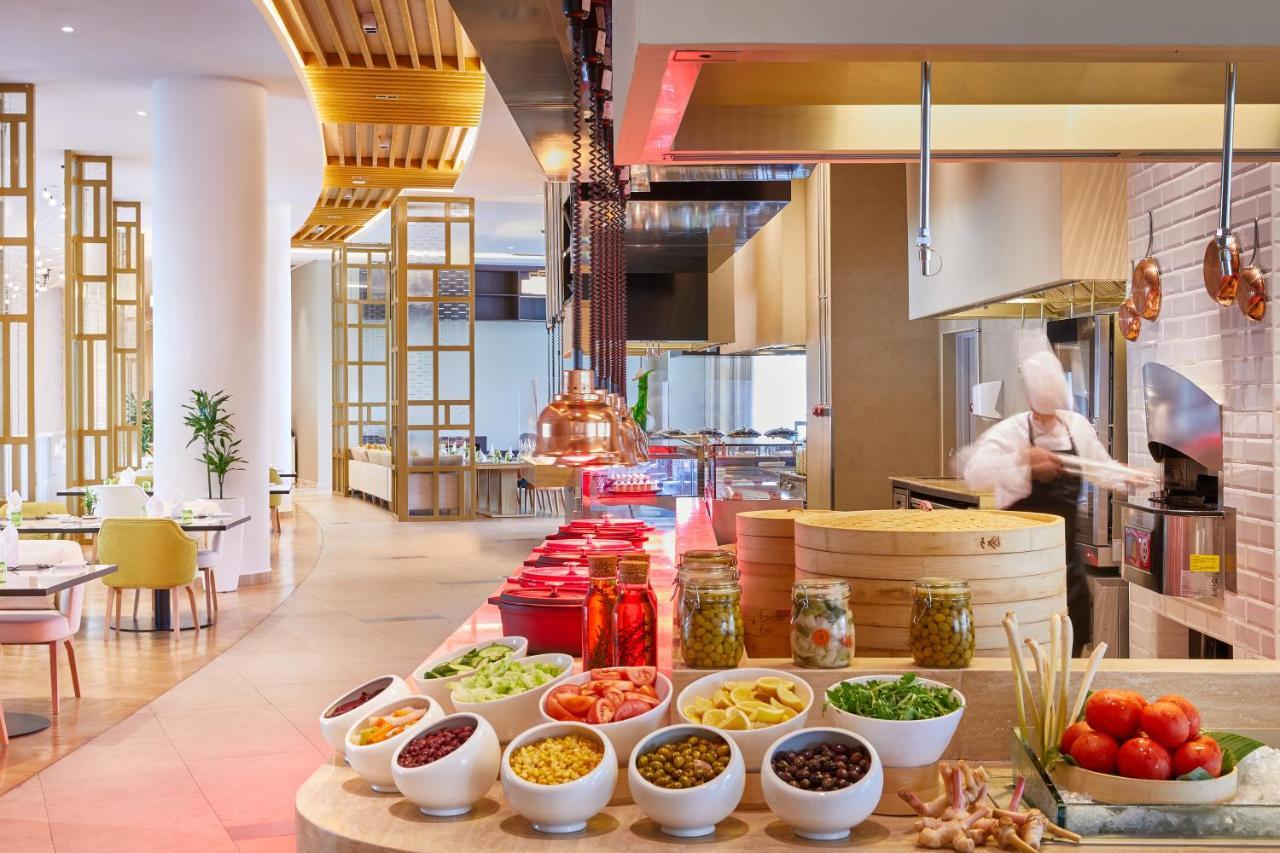 Dusitd2 Salwa Doha Hotel Exterior photo The Kitchen Table