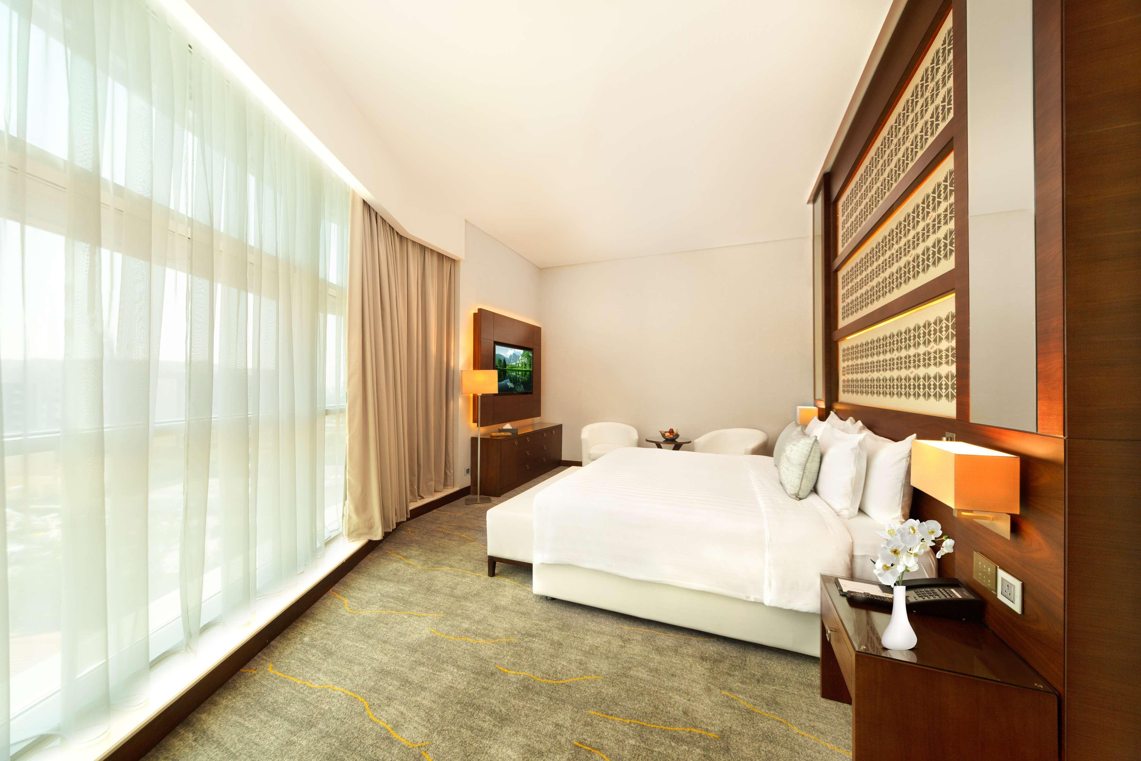 Dusitd2 Salwa Doha Hotel Exterior photo A bedroom at the hotel