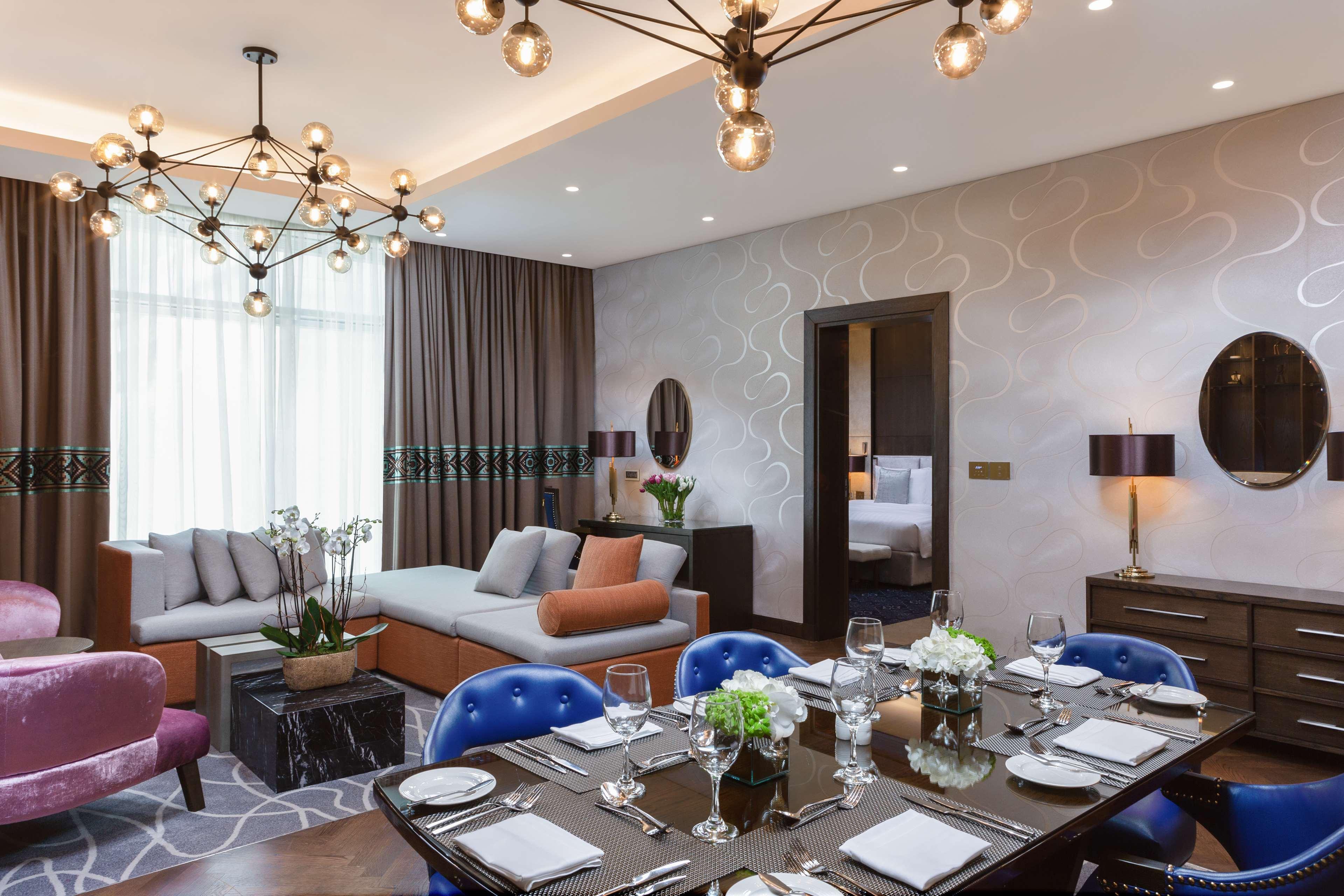 Dusitd2 Salwa Doha Hotel Exterior photo A suite at the hotel