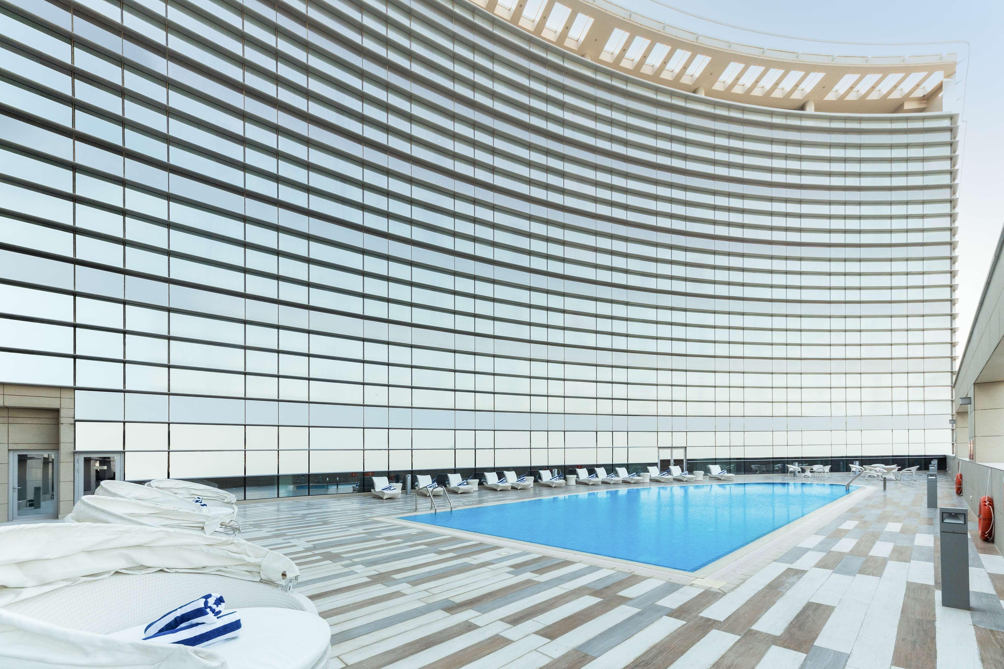 Dusitd2 Salwa Doha Hotel Exterior photo The pool at the 101
